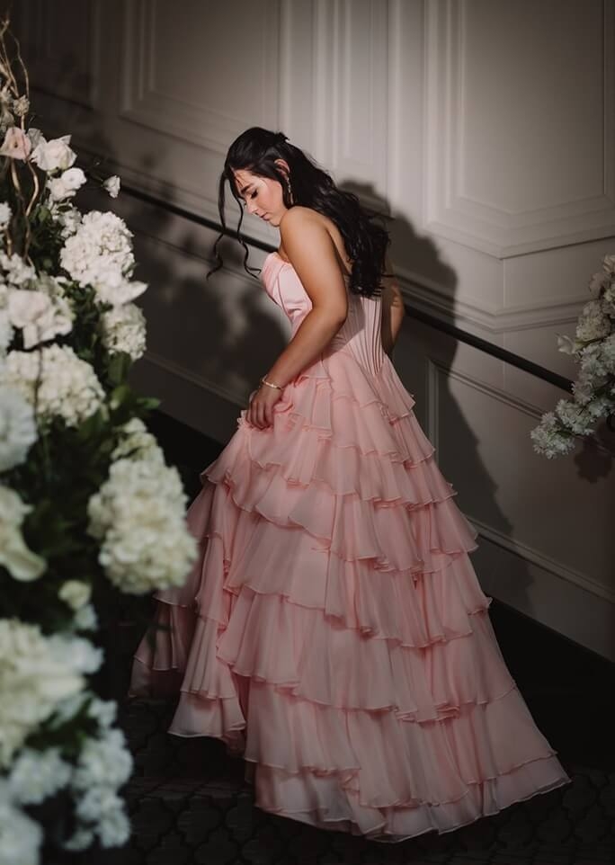 Model wearing a pink gown